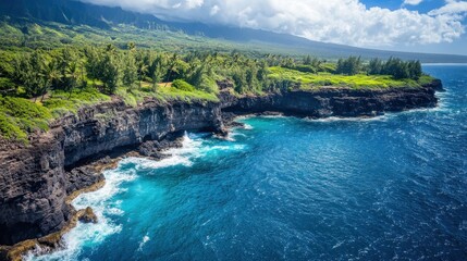 Obraz premium Coastal cliffs and green vegetation with blue ocean water.
