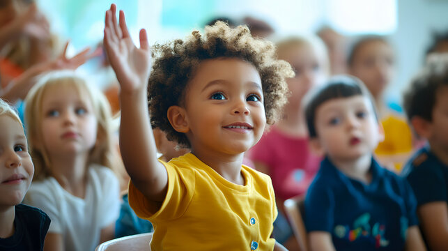 Preschool children actively respond to questions in their classroom.