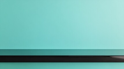 Minimal turquoise wall with black shelf.
