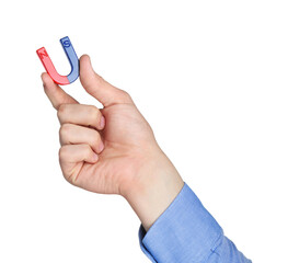 Man with horseshoe magnet on white background, closeup