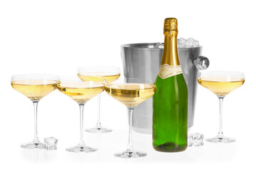 Champagne and bucket with ice isolated on white