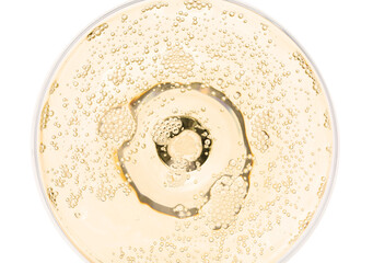 Champagne in glass isolated on white, top view