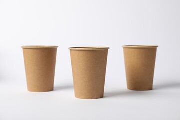 Paper cups on white background. Mockup for design