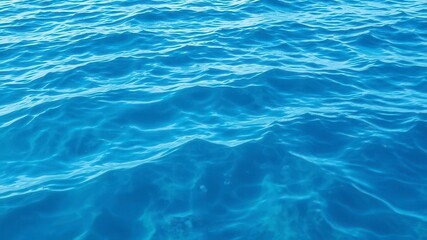 Obraz premium Blue water wave texture background with vibrant shades of blue, creating a calming and soothing pattern, water, vibrant