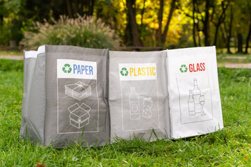 Waste management in park sorting and recycling plastic glass and paper