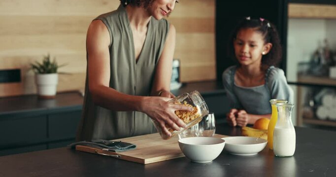 Mother, child and high five for breakfast in kitchen with cereal, wheat nutrition and meal montage. Series, family and help with healthy food, bonding together and fibre growth of childhood at house