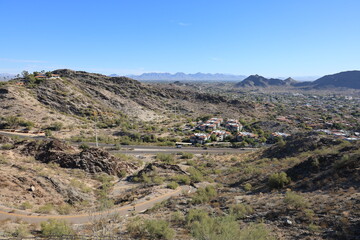 Mountain valley residential community at 7th Street in Phoenix  as seen from North Mountain Park hiking trail, Arizona