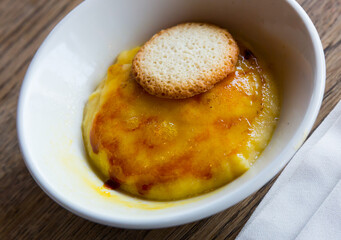Tasty dessert Creme Brulee - custard base with caramelized top
