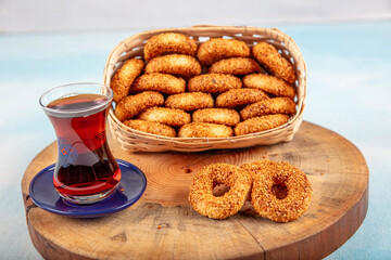 Turkish Bagel Kandil simiti with tea (stack of pastry). A savory, ring-shaped biscuits kandil simidi usually eaten on holy nights.