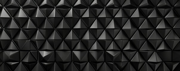 Obraz premium Triangular Tiles arranged to create a Black wall. Polished, Futuristic Background formed from blocks.