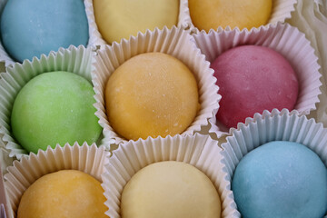 Vibrant And Colorful Mochi Treats Arranged In Paper Cups Create An Appealing Display. Perfect For Showcasing Asian Desserts, Sweet Treats, And Culinary Diversity.