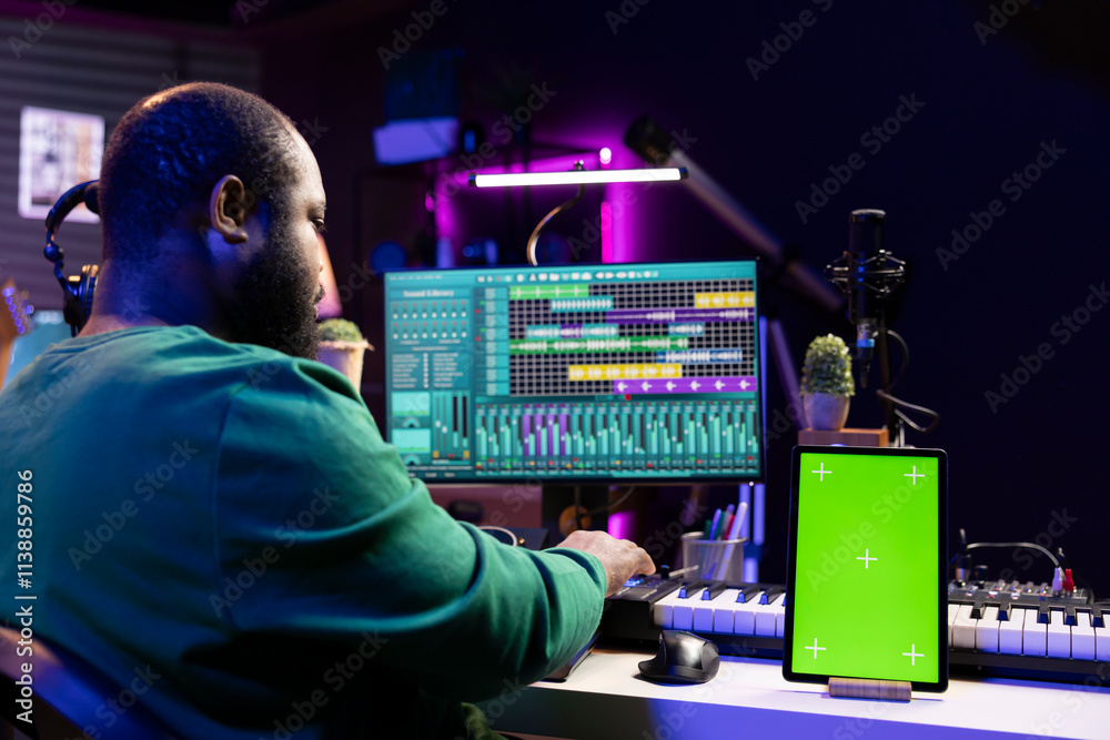 Poster sound engineer composing new tunes with daw interface, operating on greenscreen display. african ame