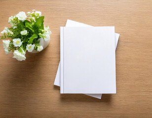blank book mockup on coffee table with decoration flowers