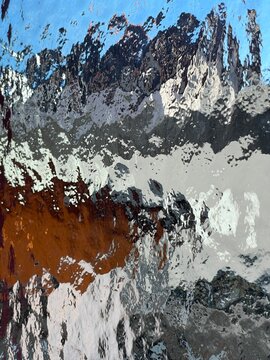 Reflections on a Water Surface Featuring Distorted and Vivid Colors for Artistic Expression