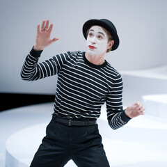 Mime Artist in Striped Shirt and Hat