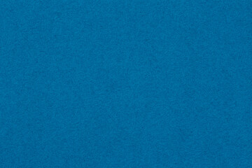Blue textured art paper background with subtle fine grain pattern