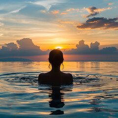 Black silhouette of asian woman splash water on summer vacation holiday