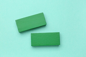 Green blocks on color background. Rules concept