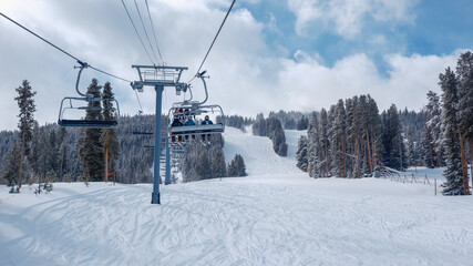Fototapeta premium Vail Colorado ski mountain photos with blue sky and scenic spring skiing. 