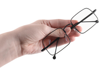 Woman holding glasses with black metal frame on white background, closeup