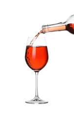 Pouring wine into glass on white background
