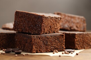 Delicious chocolate puffed rice bars on wooden table, closeup