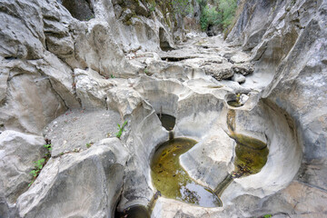 Cavernous rock formations in the shape of a gorge belonging to the source of the river Alviela