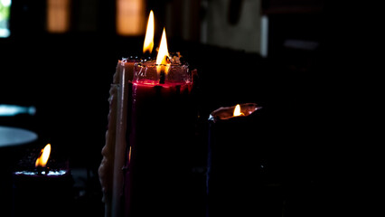 burning candles in church