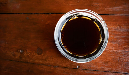 cup of coffee on wooden table