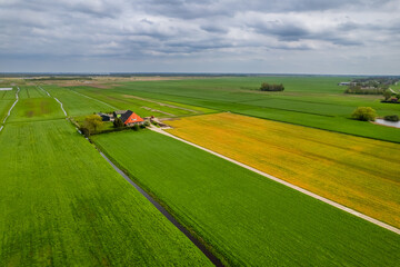 Aerial view of open farm lands and canals in the Netherlands