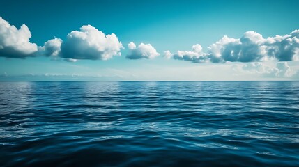 Obraz premium Vast Ocean Horizon with Fluffy Clouds. Concept of Serenity, Calm, and Nature.