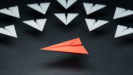 Different business concept.new ideas. paper art style. creative idea.Red and white paper plane. Leaderplane concept.3D rendering on black background.