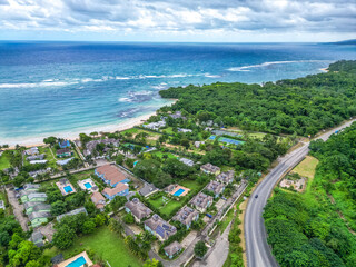 Mammee Bay Ocho Rios St Ann lush north coast aerial view of community and Caribbean sea pristine water crystal clear blue with greenery green trees pool hotels condos in Jamaica