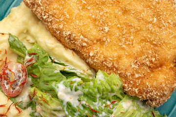 Chicken schnitzel stuffed with cheddar cheese