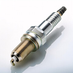 A spark plug with a metal casing, ceramic insulator, and a central electrode, photographed against a white background