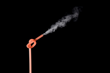 Plastic bio degradable straws with mist shooting from straws creating unique patterns