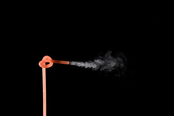 Plastic bio degradable straws with mist shooting from straws creating unique patterns