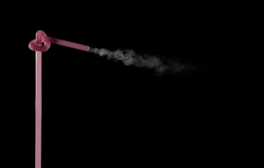 Plastic bio degradable straws with mist shooting from straws creating unique patterns