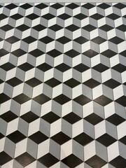 White and black and grey pattern with a modern design.