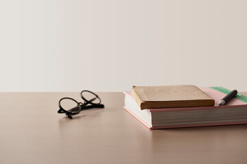 A comfortable workspace. A wooden desk with various objects.