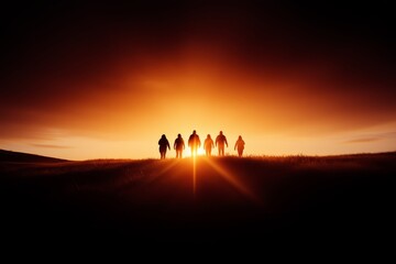 Fototapeta premium Silhouetted figures walking towards a vibrant sunset, creating a sense of hope and unity in their journey.