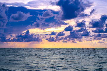 Seascape with dramatic sky and colorful clouds. Sky over sea water landscape. Stormy dramatic sky. Scenic seascape at sea.