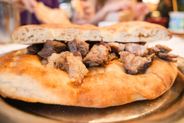 A Scrumptious Plate of MeatStuffed Flatbread Ready to Be Enjoyed