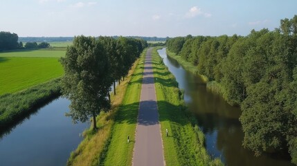Country road bike path among trees, aerial view from above