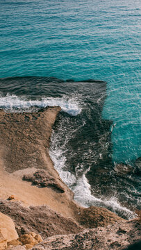A Photographer's Dream: Capturing the Raw Beauty of Ajiba Beach's Dramatic Cliffs and Crystal-Clear Waters in Marsa Matrouh, Egypt
