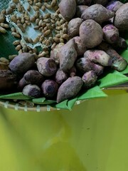 Traditional healthy snacks menu for parties in Indonesia, there are sweet corn, stewed peanuts, potatoes, bananas and breadfruit fresh from steamer.