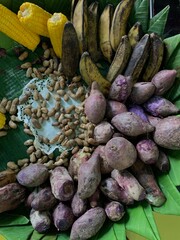 Traditional healthy snacks menu for parties in Indonesia, there are sweet corn, stewed peanuts, potatoes, bananas and breadfruit fresh from steamer.