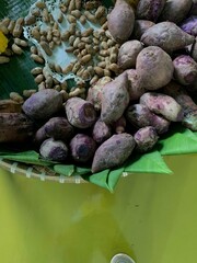 Traditional healthy snacks menu for parties in Indonesia, there are sweet corn, stewed peanuts, potatoes, bananas and breadfruit fresh from steamer.