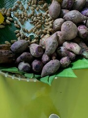 Traditional healthy snacks menu for parties in Indonesia, there are sweet corn, stewed peanuts, potatoes, bananas and breadfruit fresh from steamer.
