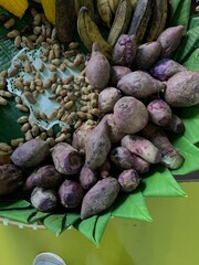 Traditional healthy snacks menu for parties in Indonesia, there are sweet corn, stewed peanuts, potatoes, bananas and breadfruit fresh from steamer.